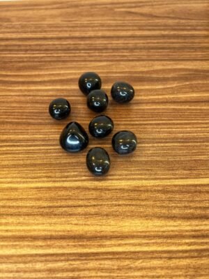 PIERRE ROULÉE D'OBSIDIENNE NOIRE OEIL CÉLESTE